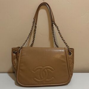 CHANEL✨ Timeless Half Moon Flap Bag in camel/dark beige caviar leather.